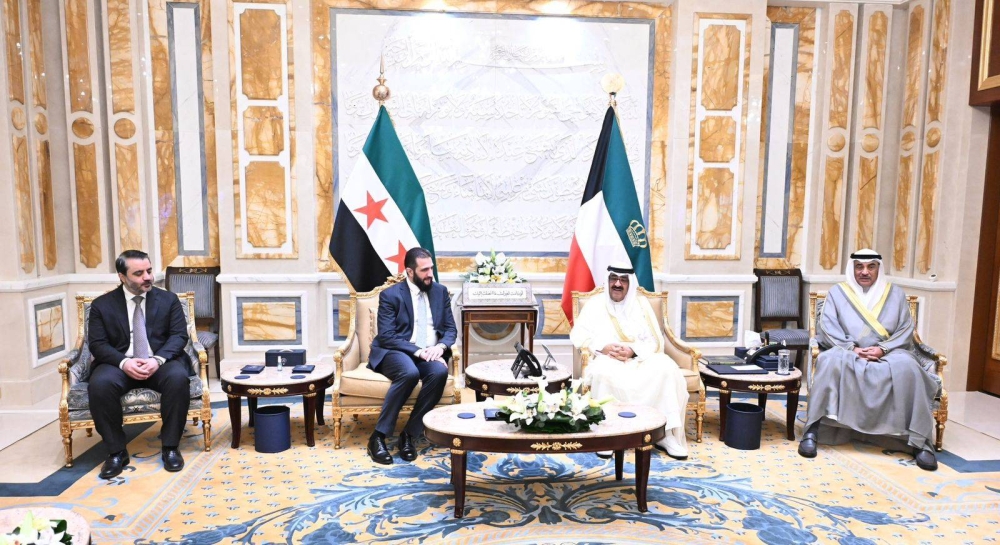 لافتة تثير الجدل في لقاء أمير الكويت والرئيس السوري!