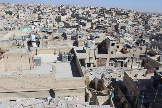 المصري: حل حكومي نهائي لأراضي المخيمات المتعثرة وفق التعويض العادل