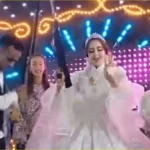 ظهور عروس بسلاح آلي في حفل زفاف بقنا