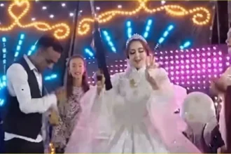 ظهور عروس بسلاح آلي في حفل زفاف بقنا